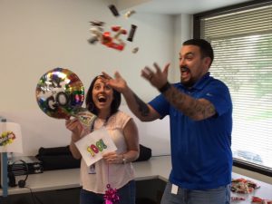 Melissa Richardson and Matt Bergey celebrating 100 hires at Deacom.