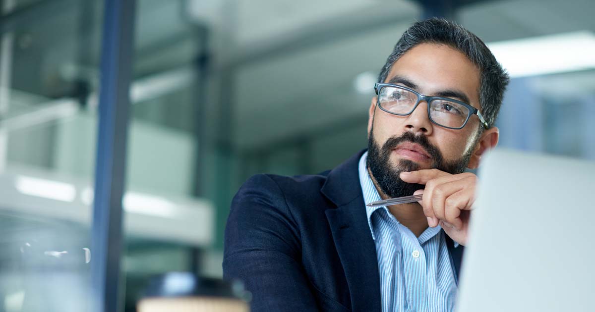 Business person contemplating new ERP solutions